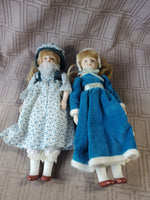 (A) Pair of Small Dolls