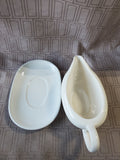 White Stoneware Gravy Boat and Saucer