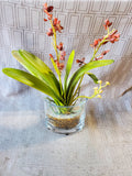 Faux Orchid Arrangement in Clear Glass Vase