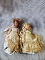 (B) Pair of Small Dolls