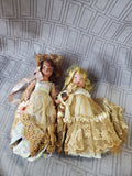 (B) Pair of Small Dolls