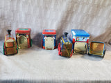 Lot of Tin Train/Truck Holiday Boxes