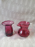 Pair of Miniature Cranberry Glass Pitchers
