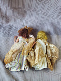 (B) Pair of Small Dolls