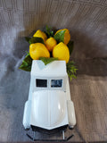 Small White Metal Truck with Faux Lemon Arrangement