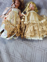 (B) Pair of Small Dolls