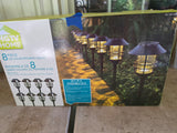 8-Piece LED Solar Pathway Lights, Unopened Packaging