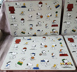 Set of 4 Pottery Barn Kids "Peanuts" Placemats