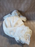 Porcelain Baby Doll in White Gown