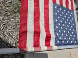 American Flag on Wooden Pole