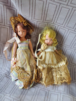 (B) Pair of Small Dolls