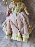 Vintage Doll in Purple Dress