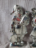 Pair of Silver Toned Resin Santa Figurines