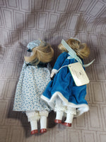 (A) Pair of Small Dolls