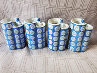 Set of 4 Blue and White Ceramic Vases