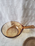 Pair of Corning Ware Visions Amber Glass Sauce Pans with One Lid