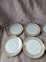 Set of 10 Fine Porcelain Saucers