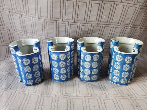 Set of 4 Blue and White Ceramic Vases