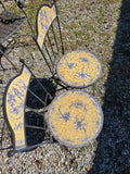 Two Black Metal Folding Chairs w/Yellow and Blue Mosaic Tile Seats