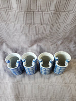 Set of 4 Blue and White Ceramic Vases