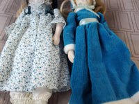 (A) Pair of Small Dolls