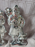 Pair of Silver Toned Resin Santa Figurines