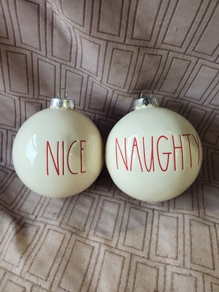 Pair of Rae Dunn Naughty and Nice Ornaments
