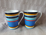 Pair of Lenox DKNY Mult-Colored Mugs (A)
