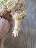 Vintage Doll in Purple Dress