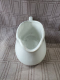 White Ceramic Gravy Boat and Saucer