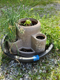 Multi-Tier Plastic Planter w/Plants and Oversized Plastic Saucer