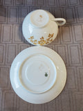 Gold Toned Floral Teacup and Saucer Set