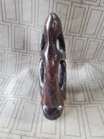 Carved Stone Sitting Person Sculpture