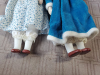 (A) Pair of Small Dolls