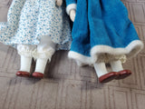 (A) Pair of Small Dolls