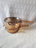 Pair of Corning Ware Visions Amber Glass Sauce Pans with One Lid