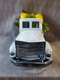 Small White Metal Truck with Faux Lemon Arrangement