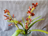 Faux Orchid Arrangement in Clear Glass Vase
