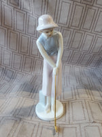 Russ Porcelain Golfing Lady Figurine