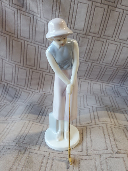 Russ Porcelain Golfing Lady Figurine