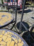 Two Black Metal Folding Chairs w/Yellow and Blue Mosaic Tile Seats