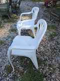 Two Plastic Outdoor Chairs