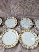 Set of 10 Fine Porcelain Saucers