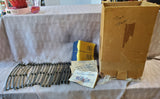 Box of Metal Model Train Tracks