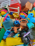 Bin of Small Plastic Toys