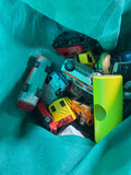 Bin of Toy Cars, Trains, and Planes